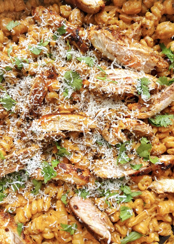 close up image of honey harissa chicken pasta