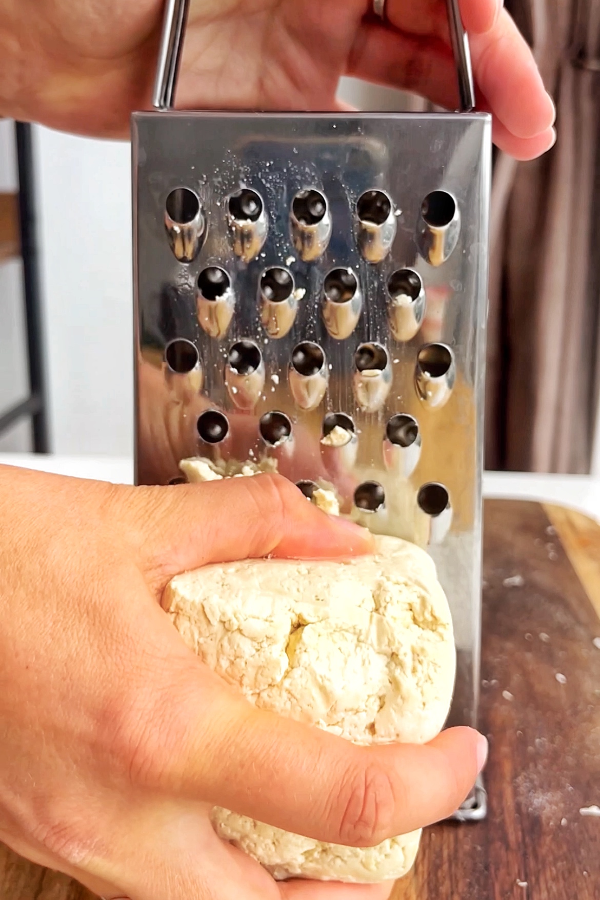 Grating tofu.