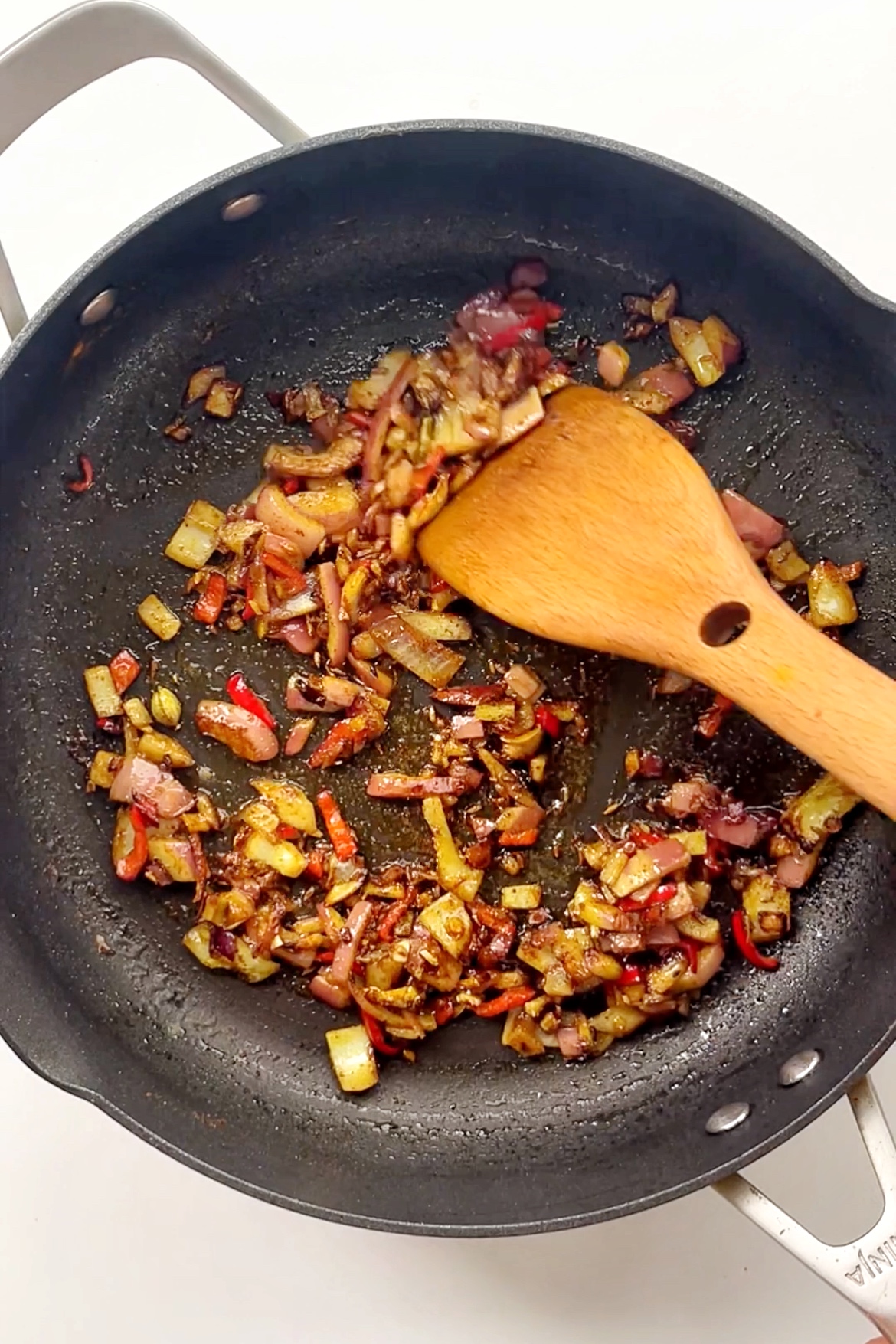 Frying spices and onions.