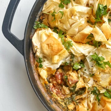Marry me chicken pie in black oven-proof skillet.