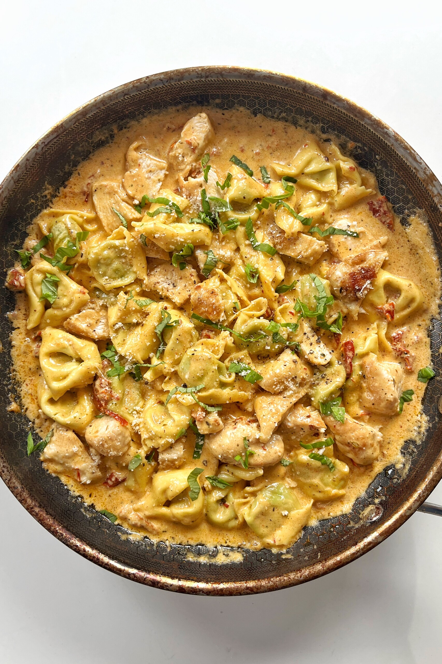Marry Me Chicken Tortellini in a pan.