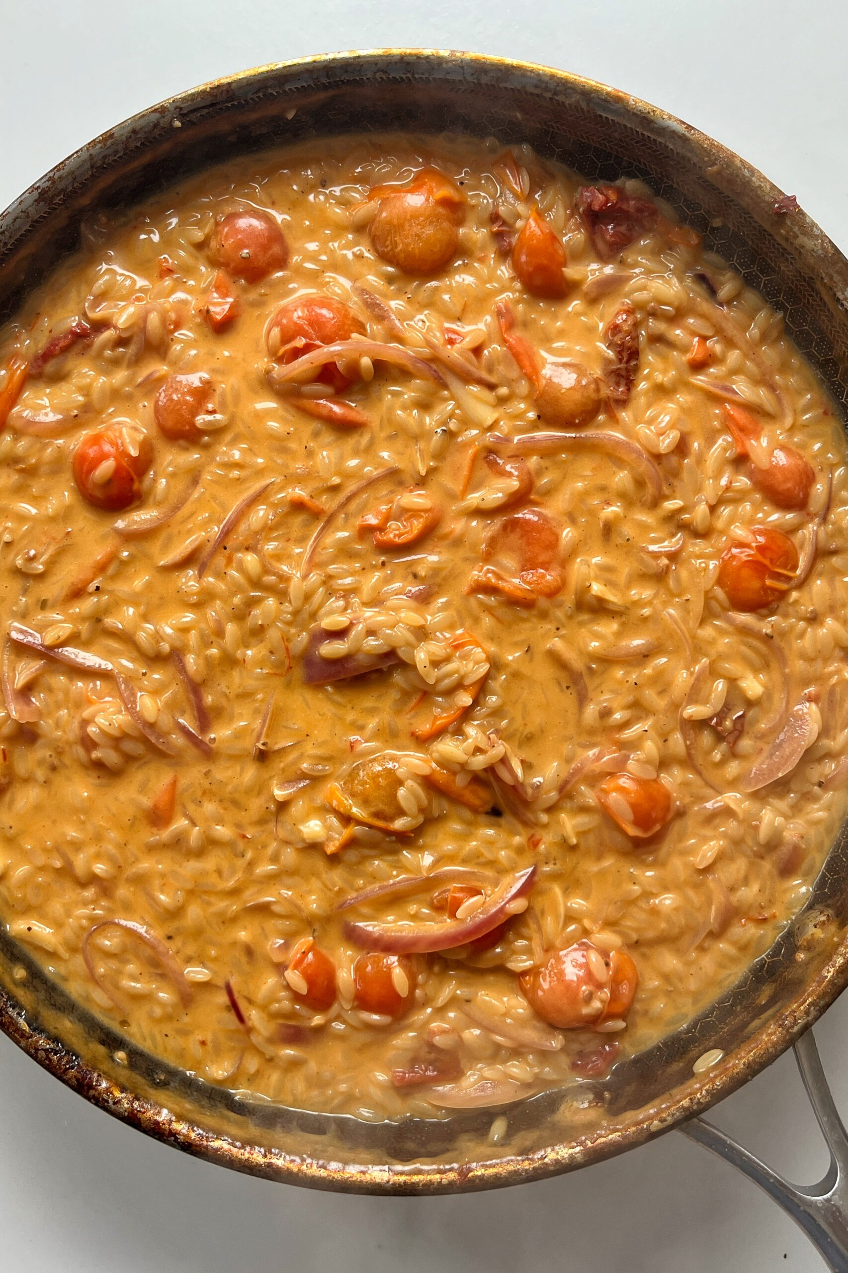 Ready to serve tomato orzotto recipe.