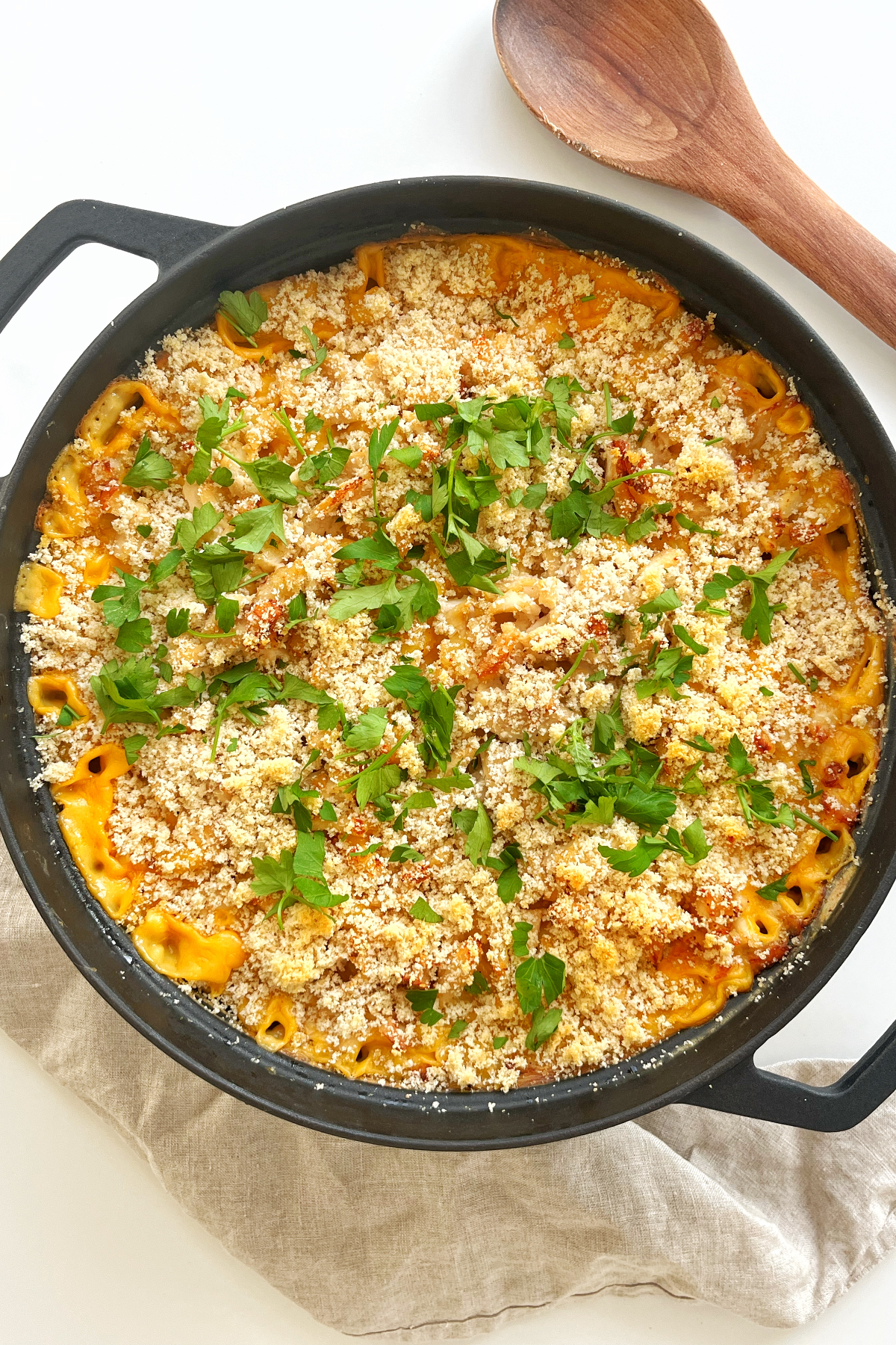 Black pan with a turkey Mac and cheese inside. 