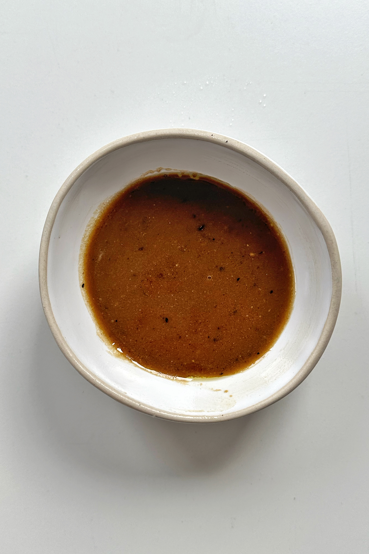Salad dressing pot.