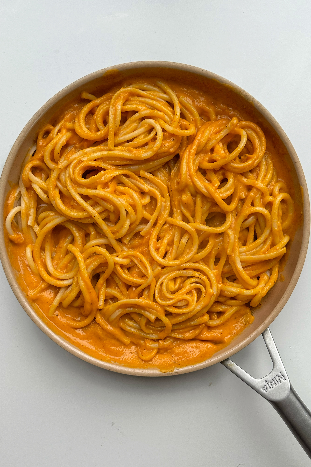 Combined spaghetti with sweet potato sauce.