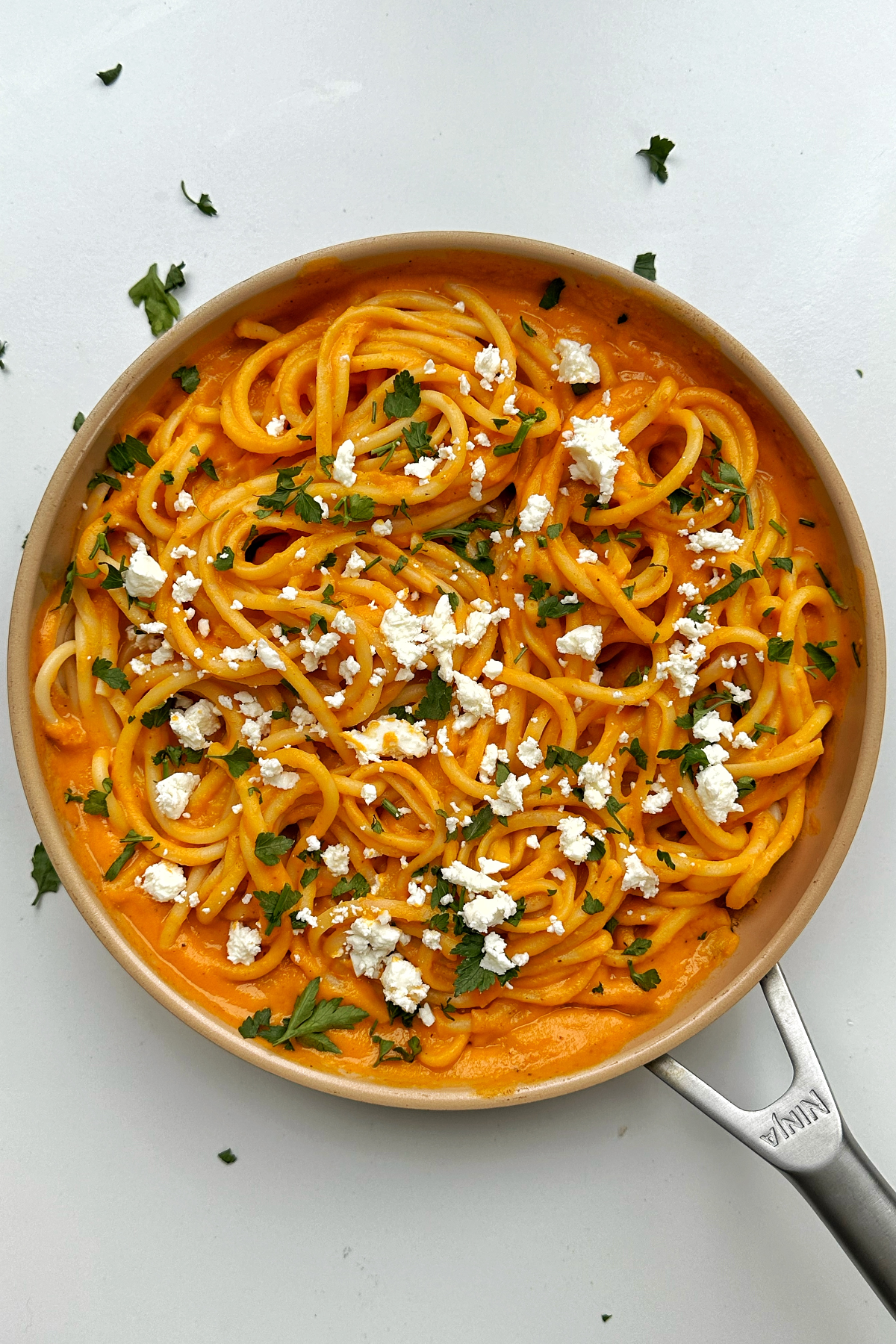 Frying pan with sweet potato pasta sauce with spaghetti.