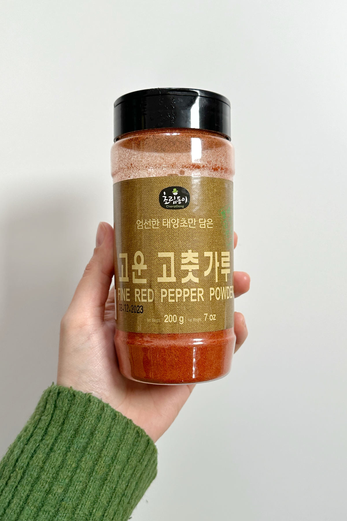 Fine red pepper flakes in a tub.