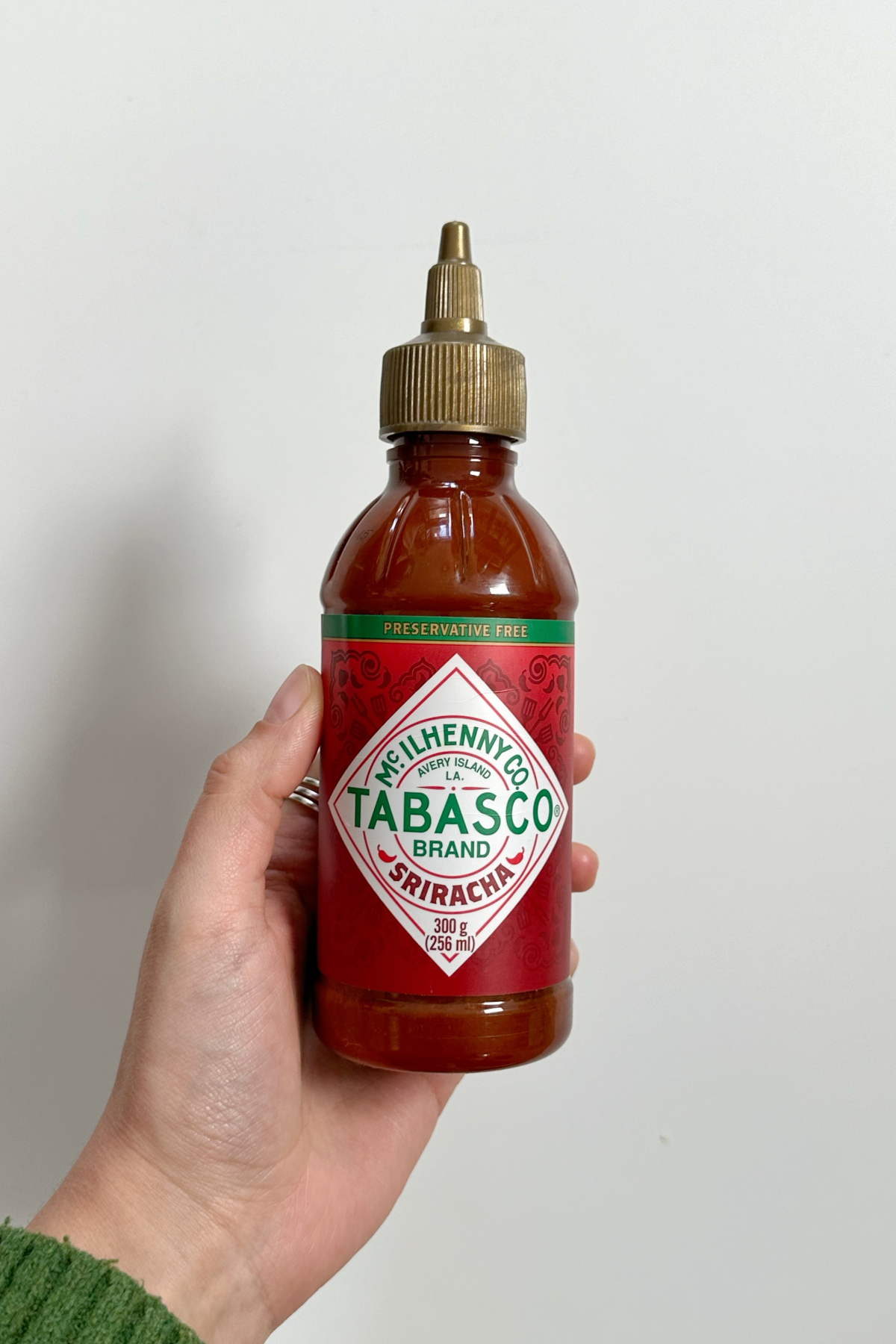 A bottle of tabasco sriracha sauce.