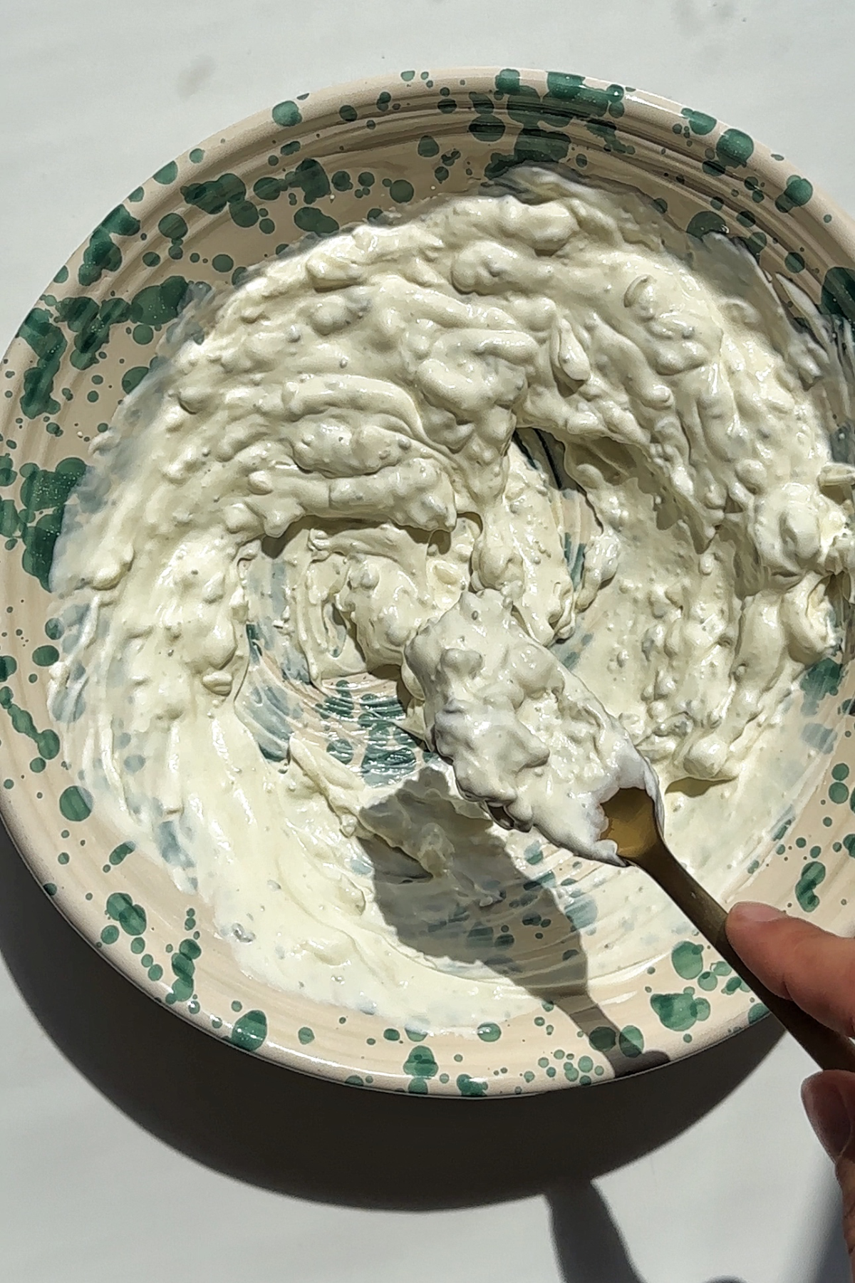 Making a homemade blue cheese sauce.