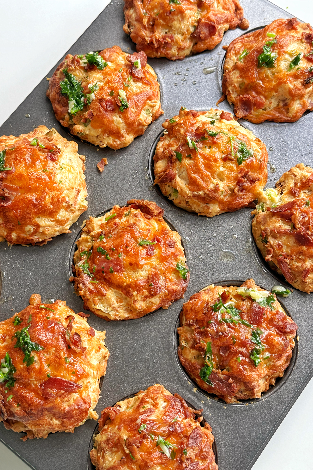 Bacon and cheese muffins cooked fresh out of the oven.