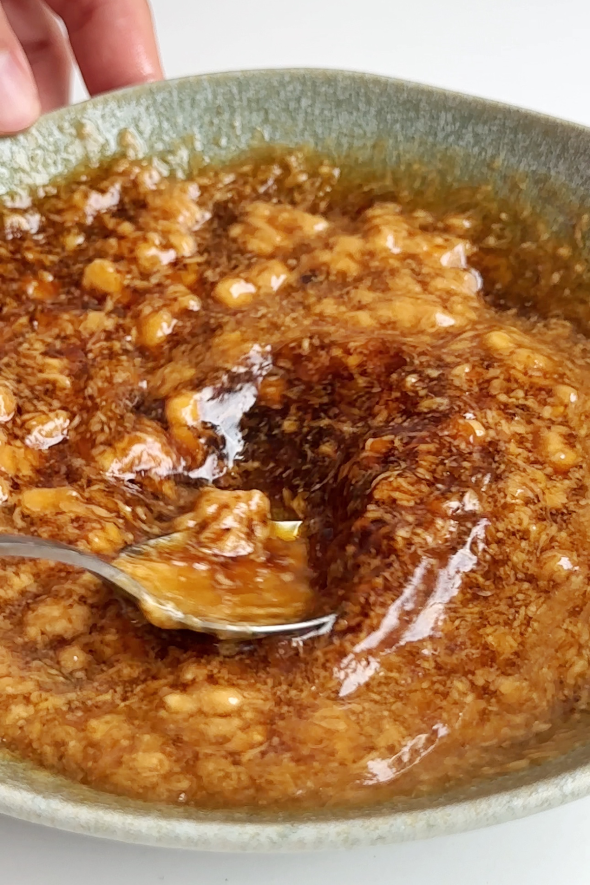 Making a sauce for the beef noodles.