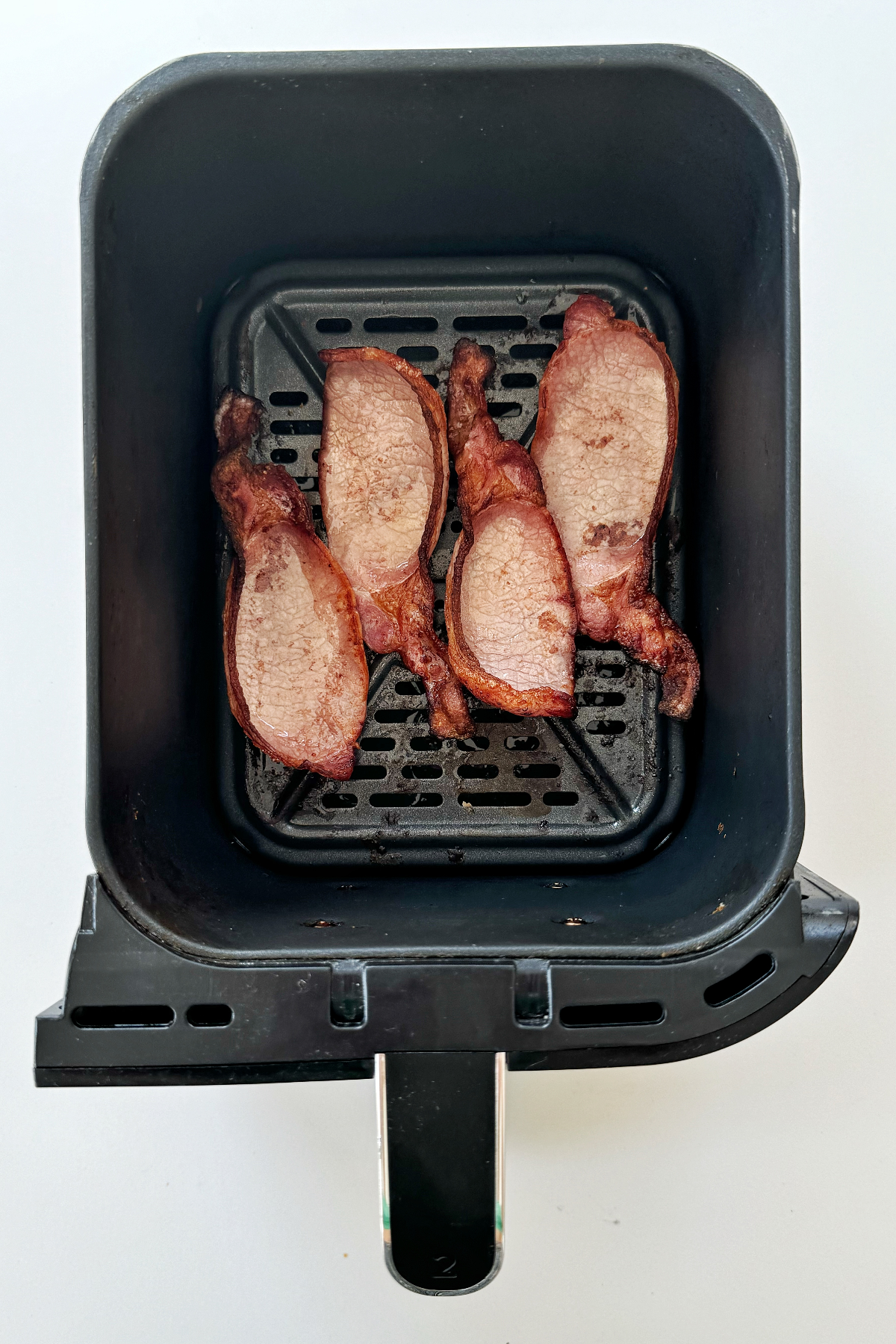 Cooked back bacon in the air fryer.
