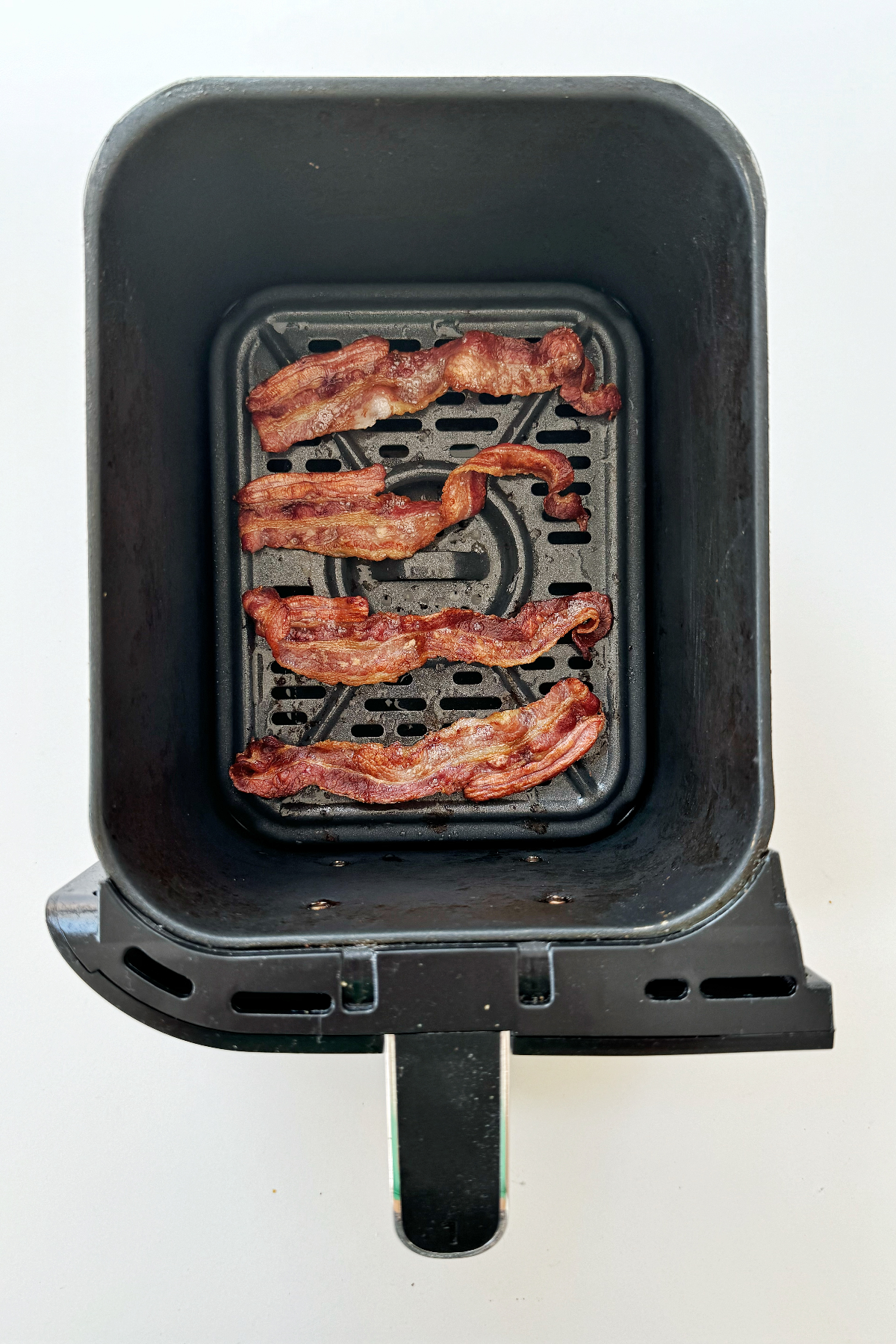 Cooked streaky bacon in ninja foodi air fryer.