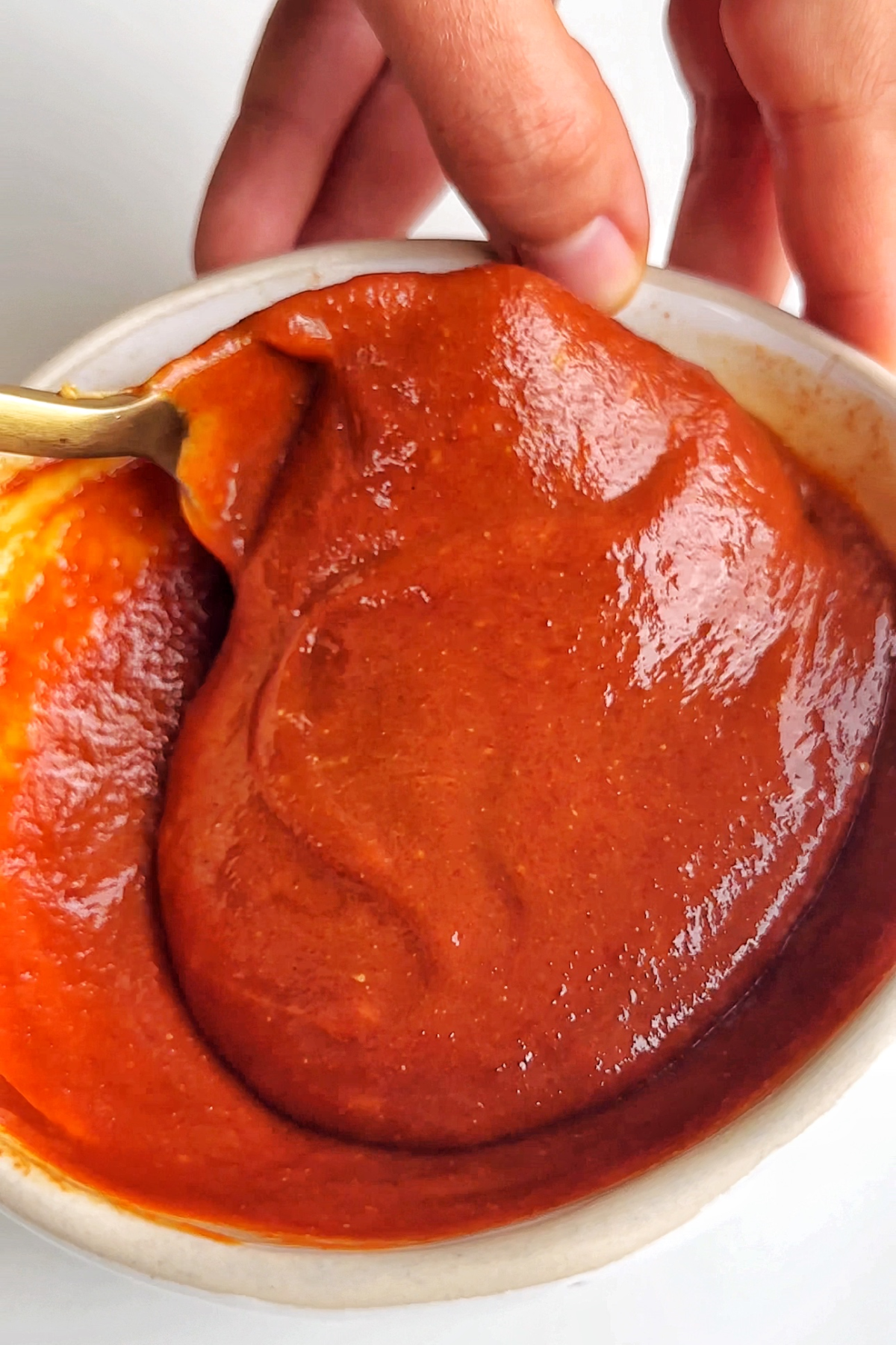 Making gochujang peanut butter sauce.