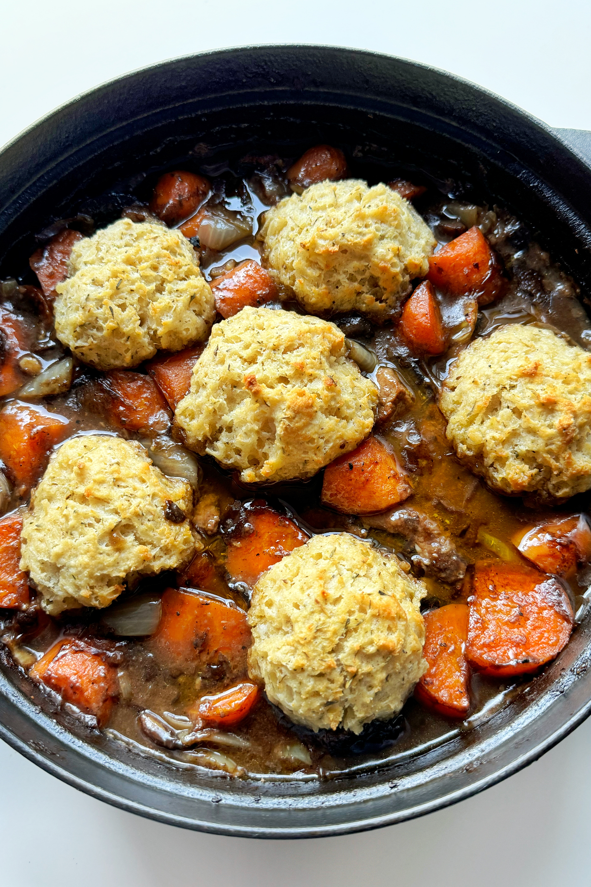 Dumplings with beef stew.