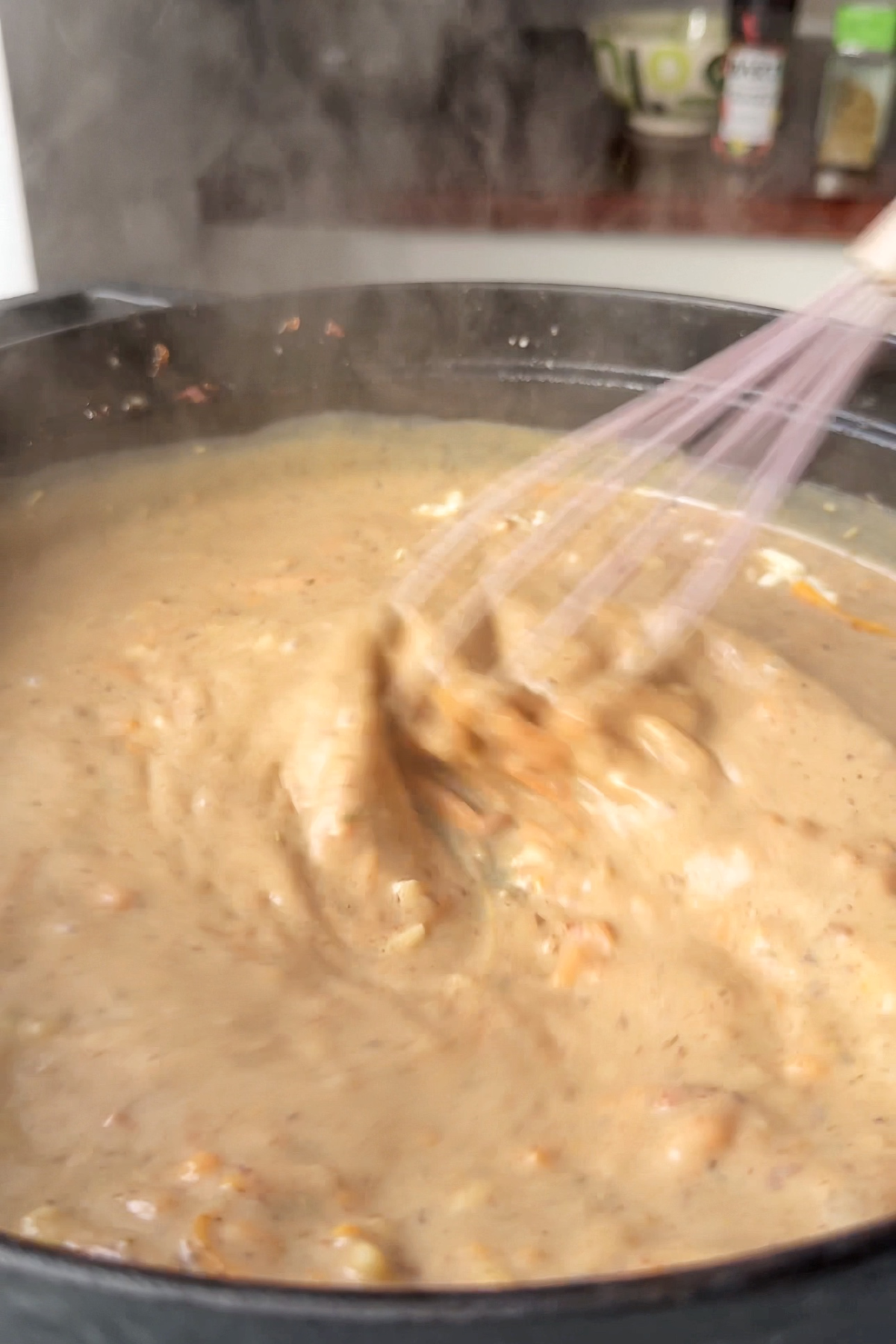 Making a béchamel sauce for chicken and broccoli pasta bake.