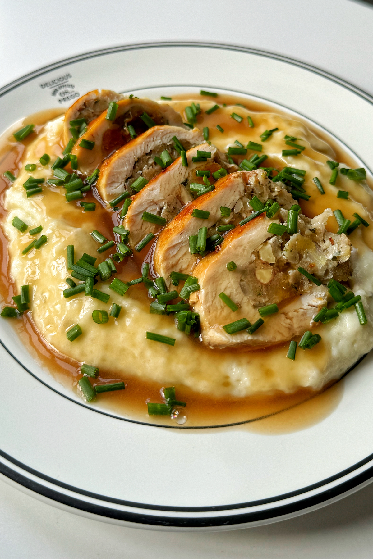 Serve up with mashed potato, gravy, and chives.