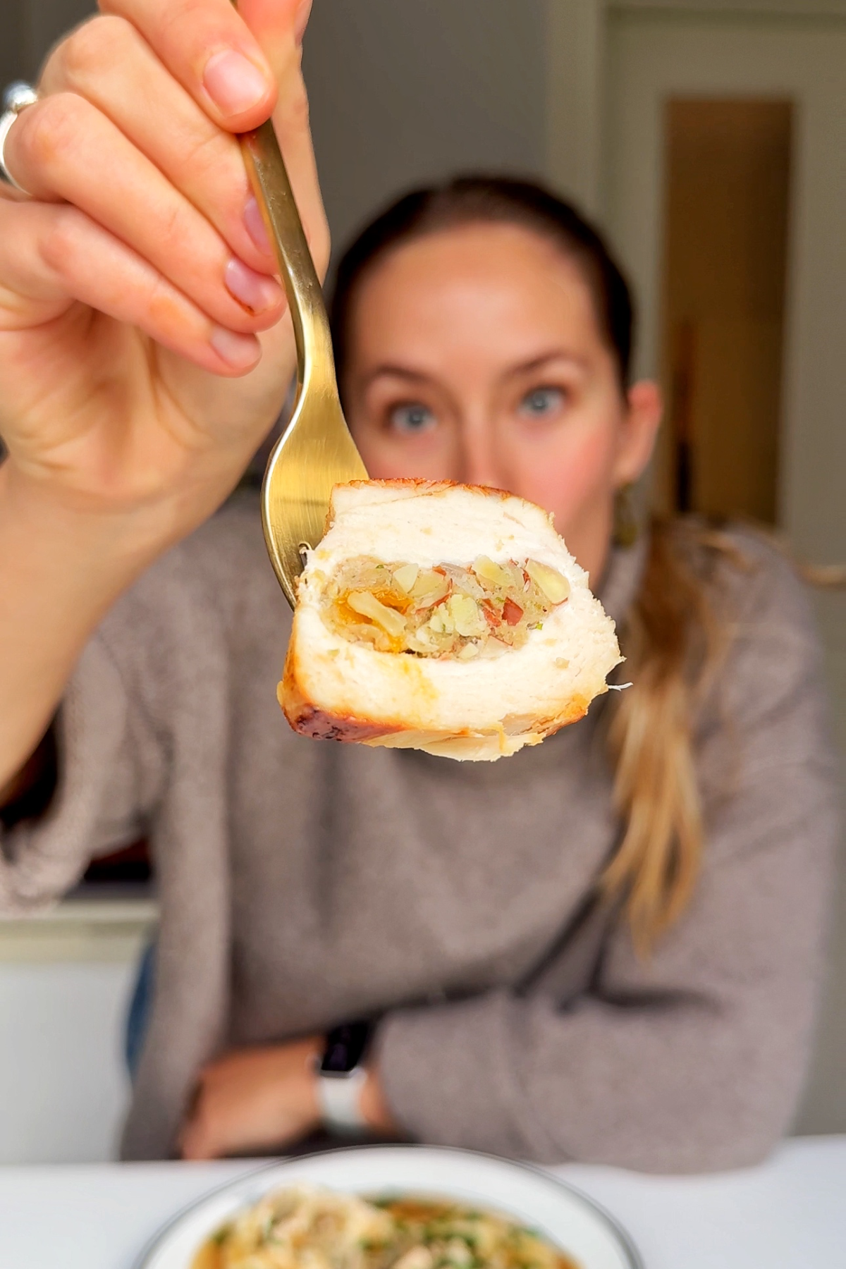 close up of the stuffed chicken breast with stuffing.