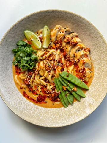 Peanut butter noodles with chicken breast.