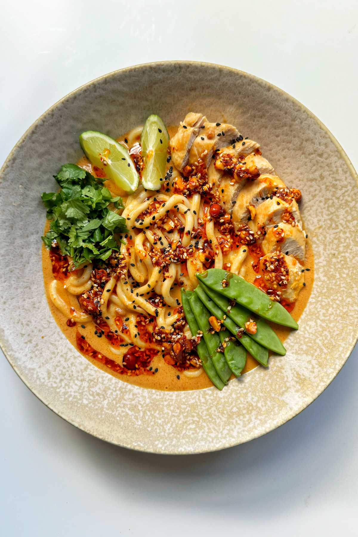 Peanut butter noodles with chicken breast.