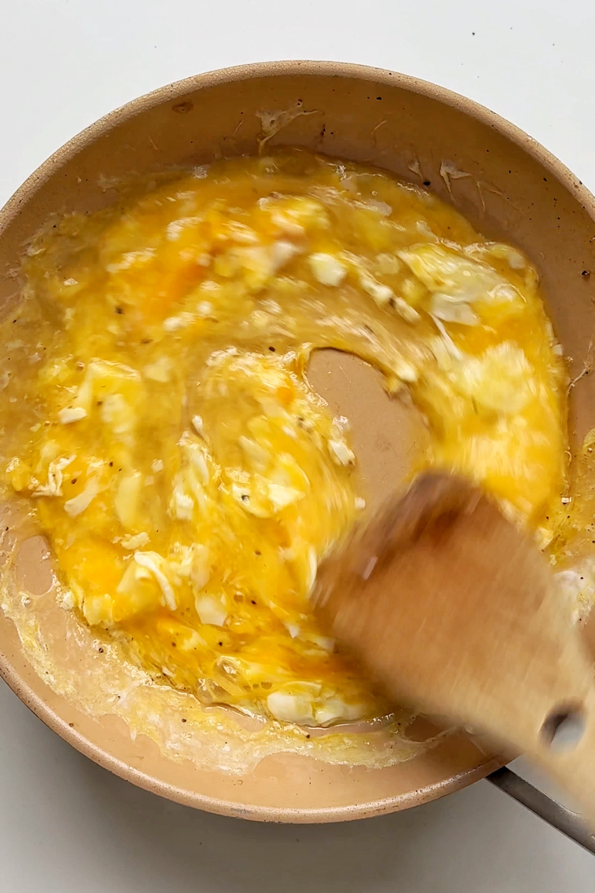 Making scrambled egg.