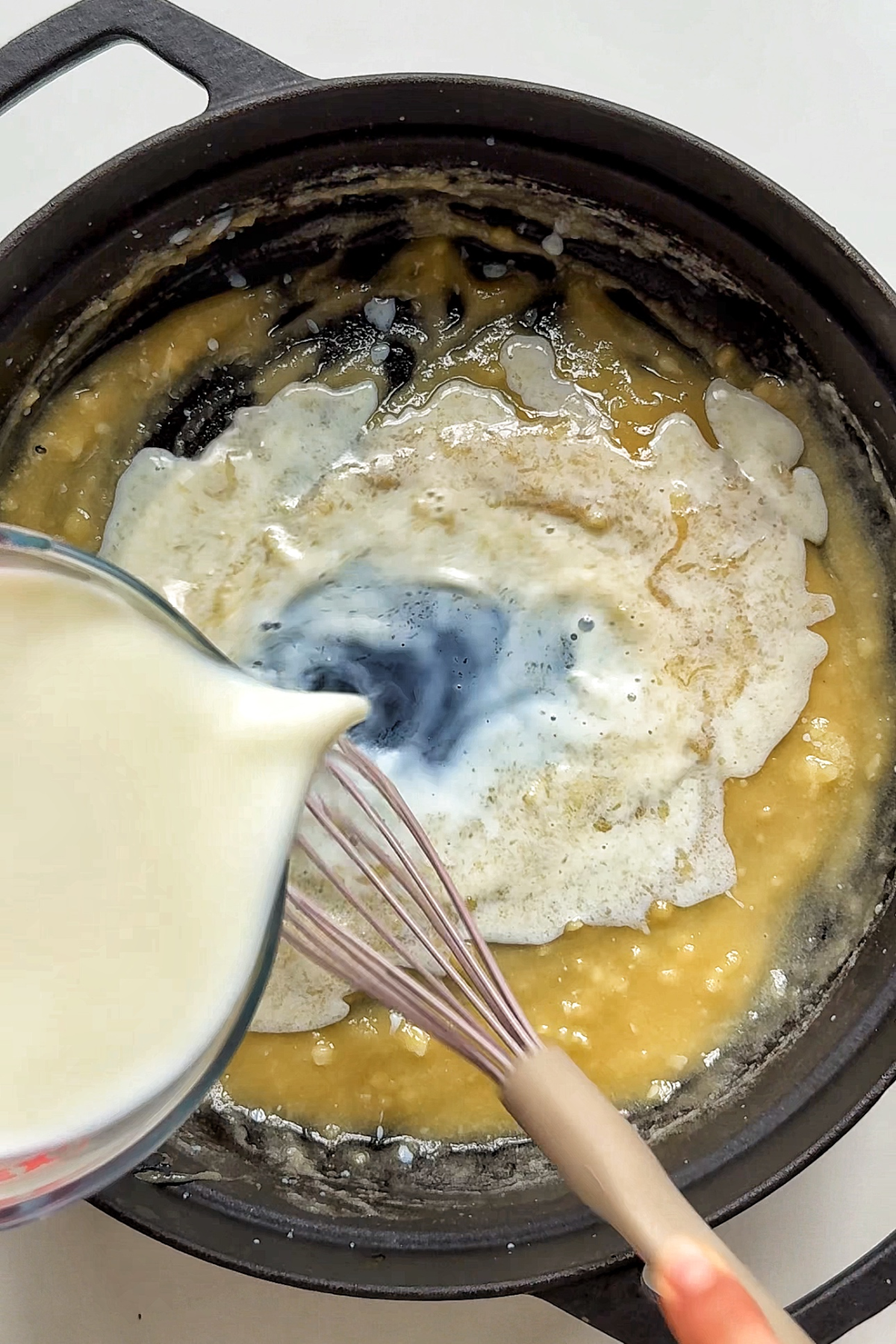 Making a béchamel-style sauce for our Mac and cheese.