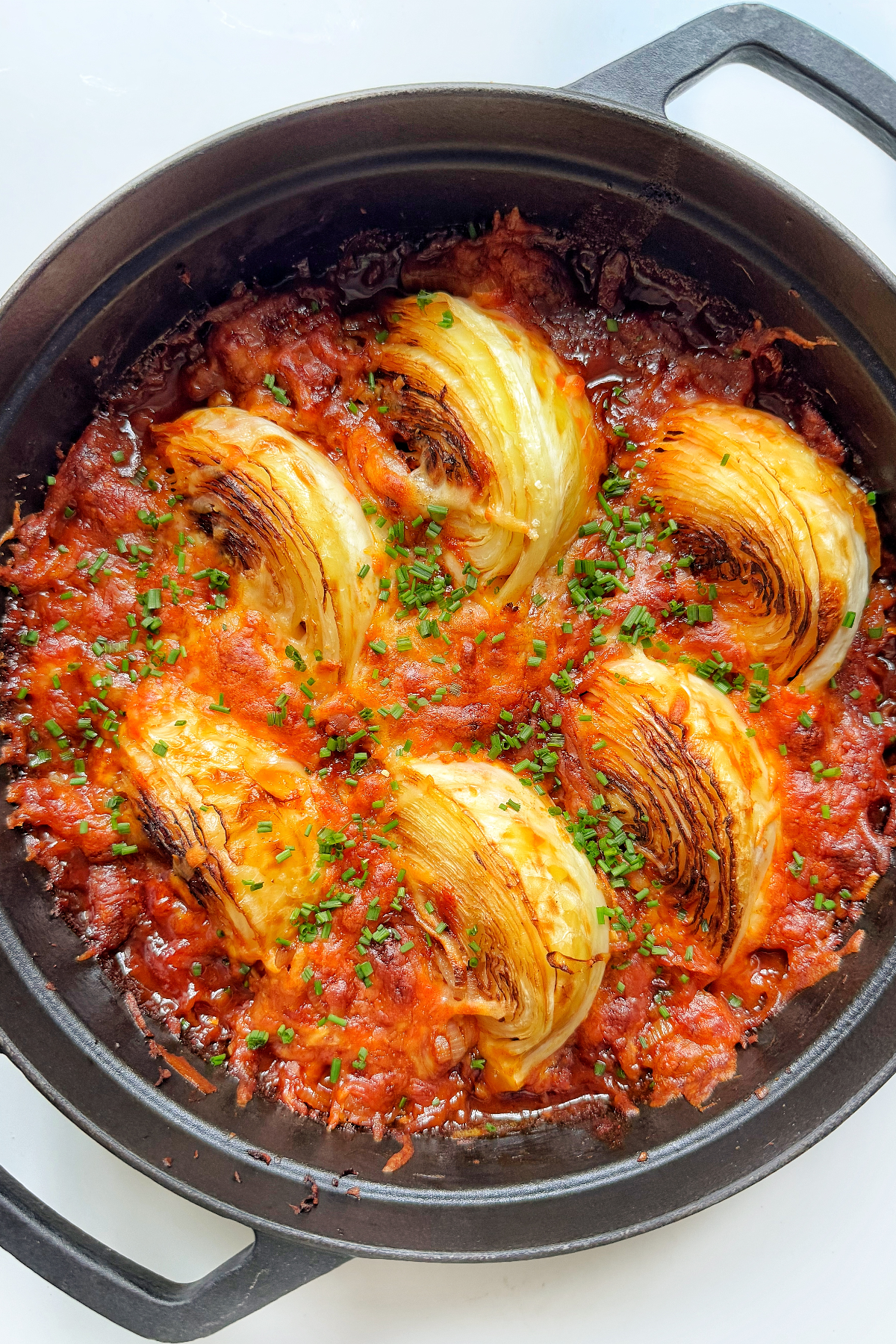 Buldak Fire Cabbage in black cast iron pan.