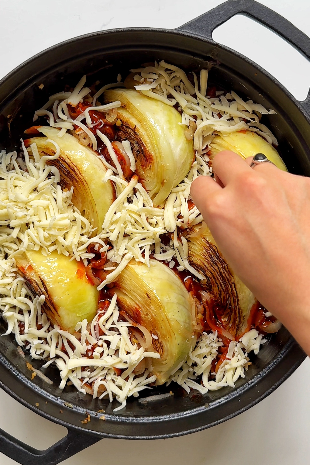Top the buldak fire cabbage with cheese.