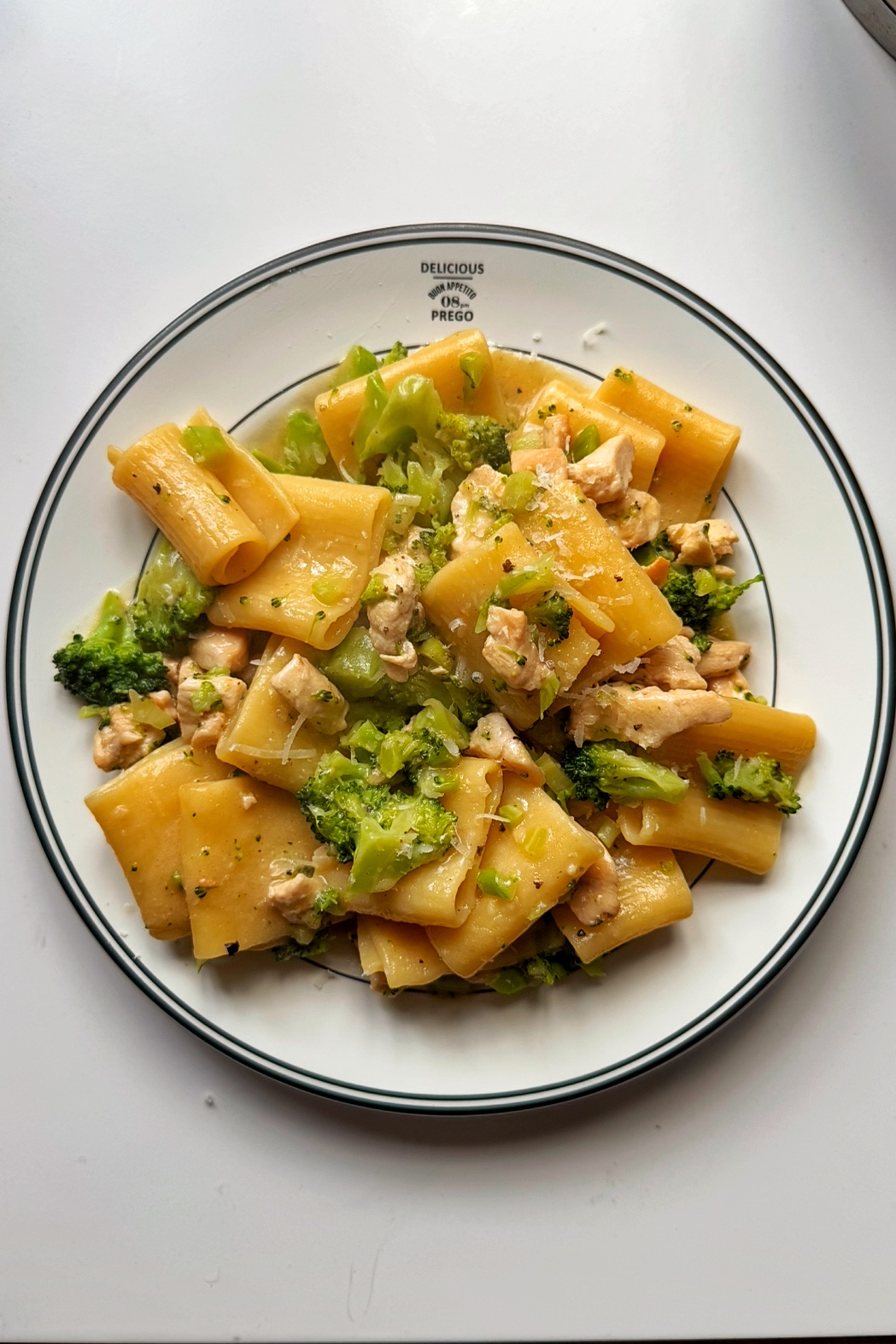 Chicken broccoli Alfredo pasta on a plate.