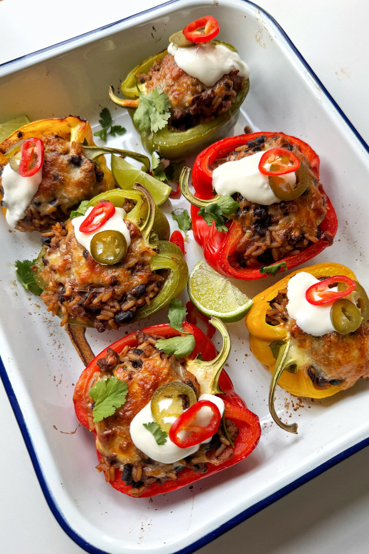 Side image of stuffed ground beef and rice peppers.