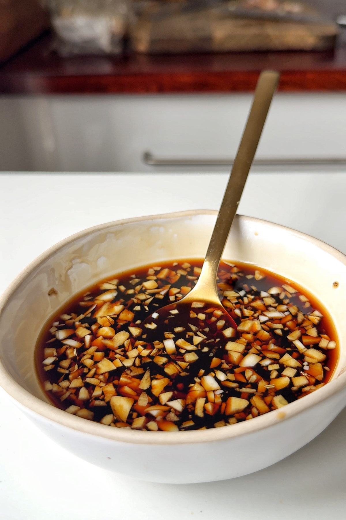 The Butadon sauce in a white bowl.