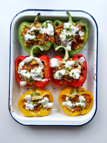 ground chicken stuffed peppers in a baking tin.