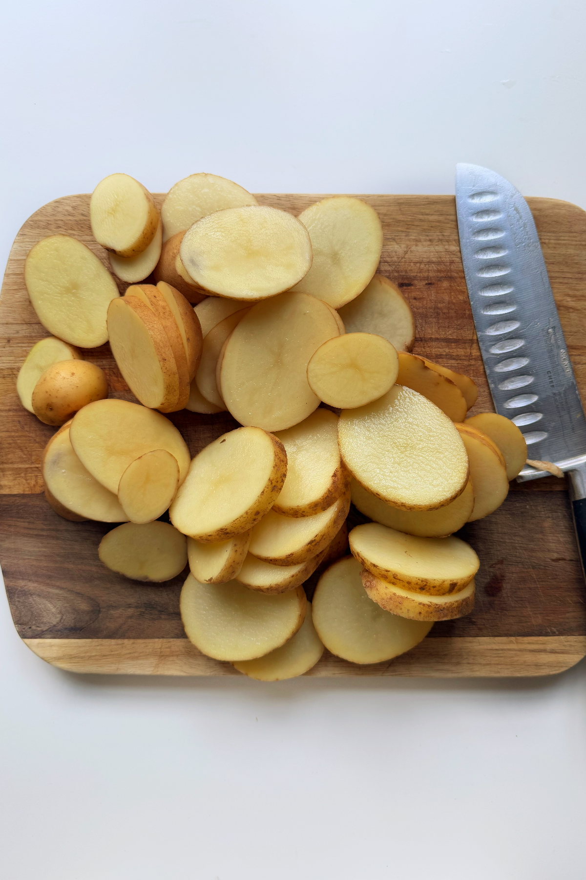 slicing up potatoes