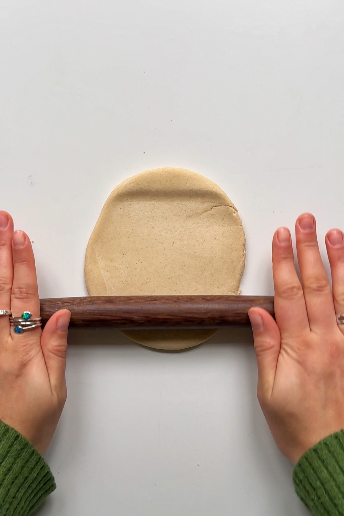 Rolling out the dough.
