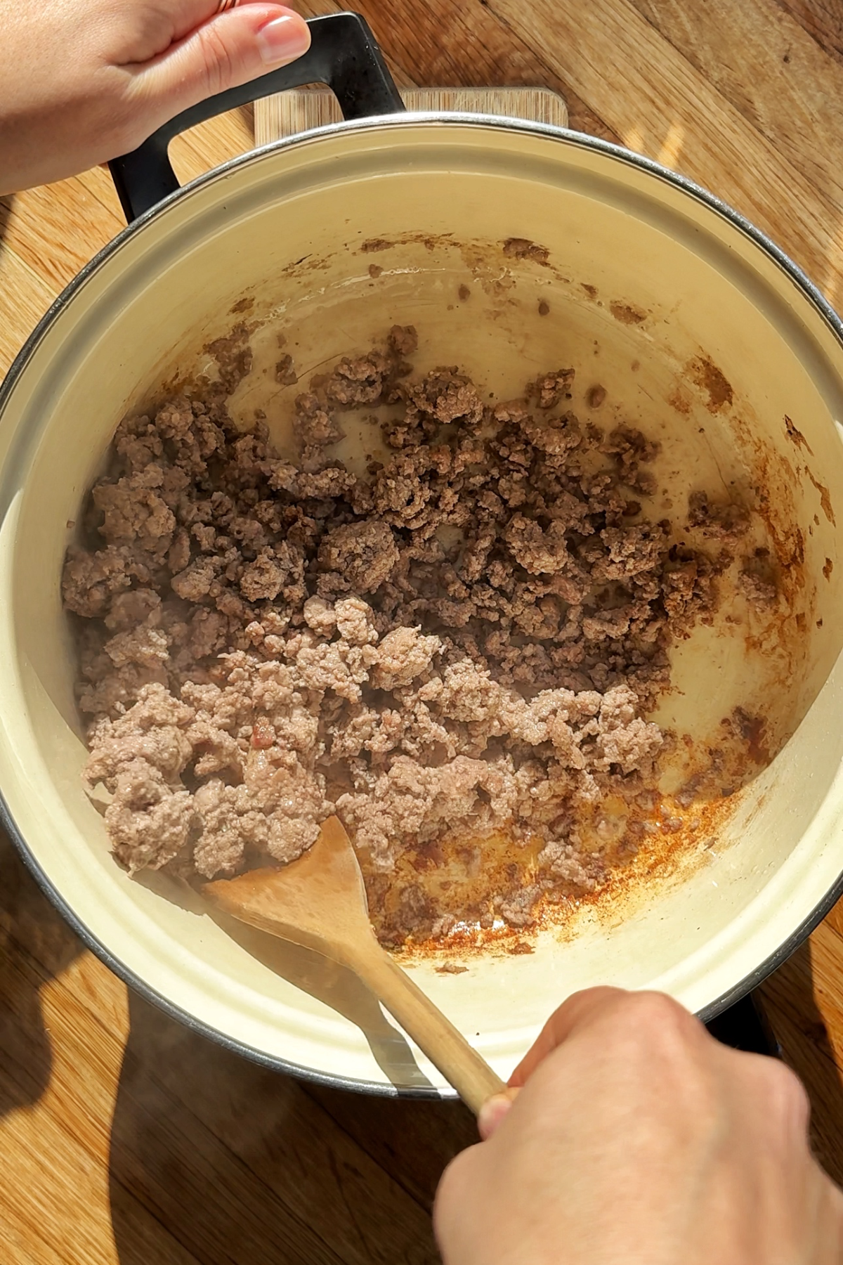 Creating a fond on the base of the pan.
