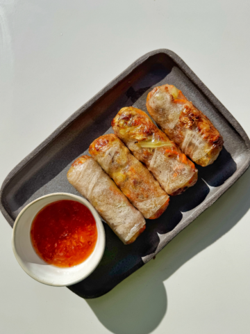 air fryer rice paper rolls with sweet chilli sauce.