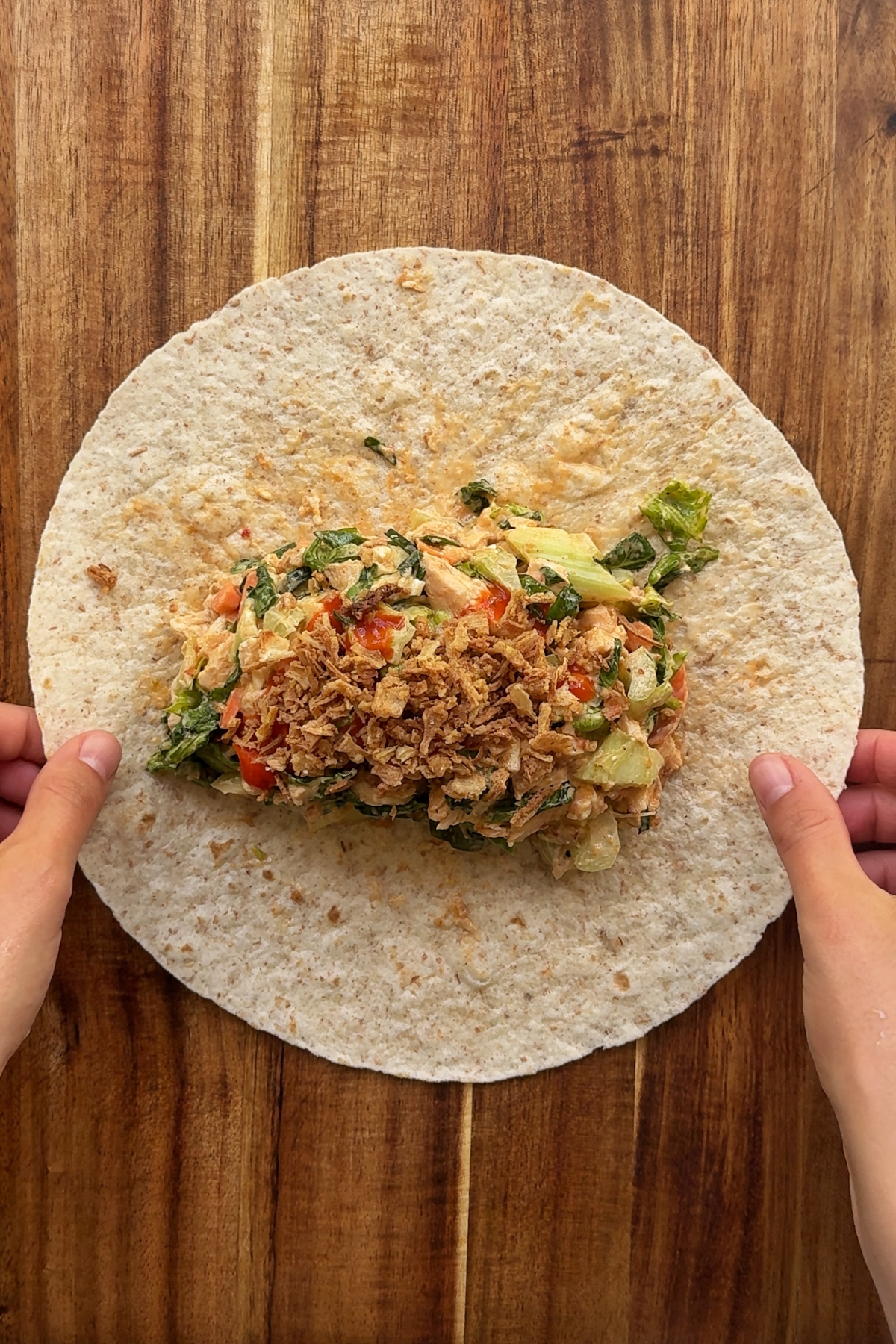Wrapping up the chicken buffalo filling.