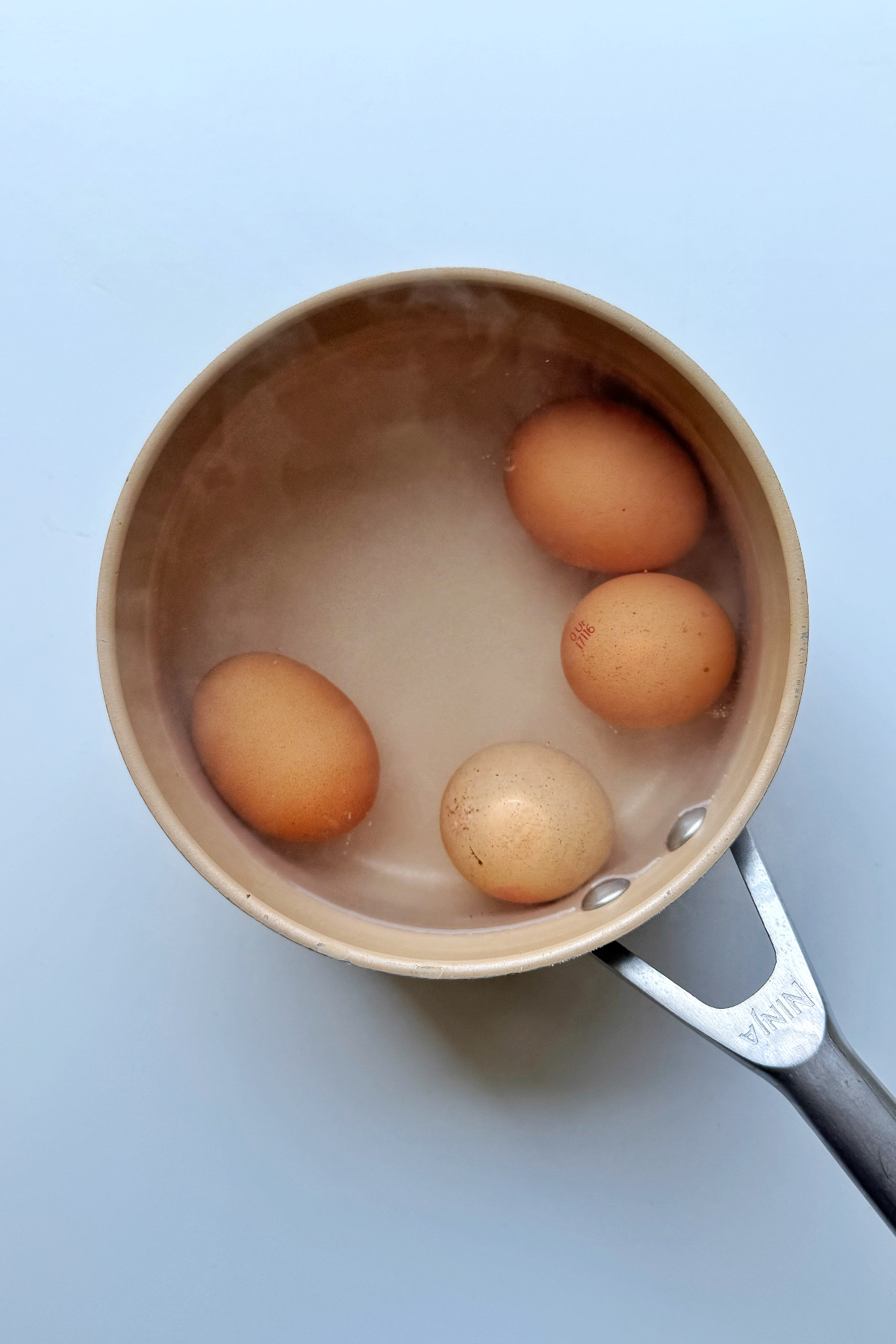 Boiling eggs for 8 minutes.