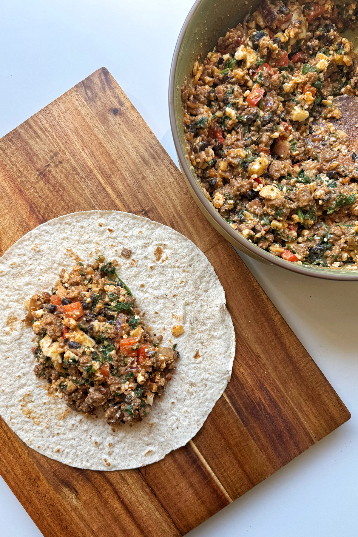 wrapping up high protein breakfast burritos.
