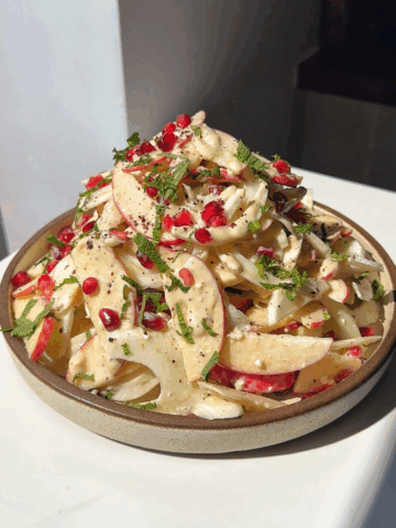 plate of apple fennel salad on plate.