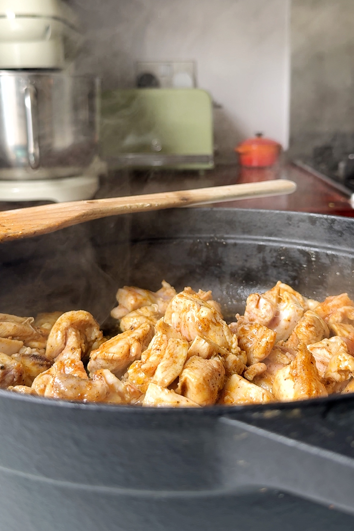 Cooking chicken in a dish.