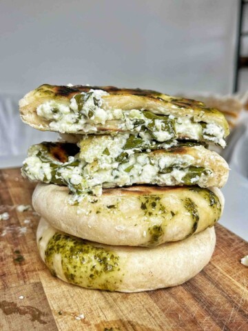 Spring feta flatbreads made with yogurt stacked on top of each other