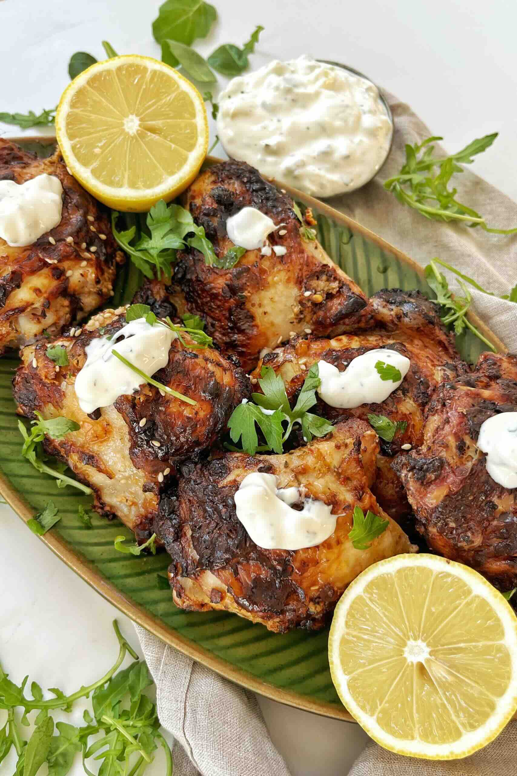 Greek yogurt dolloped on air fried chicken.