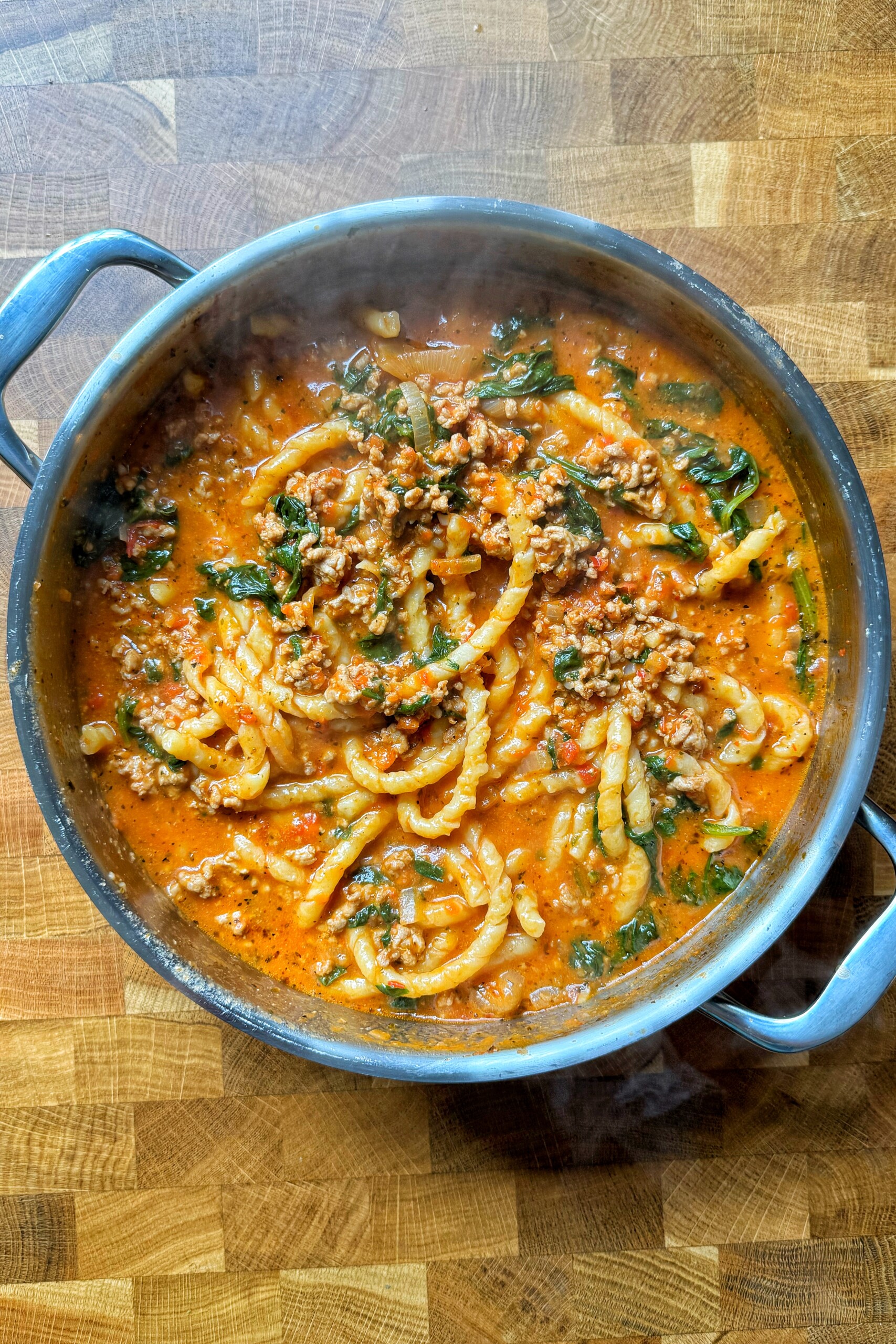 Ground turkey pasta in pan.