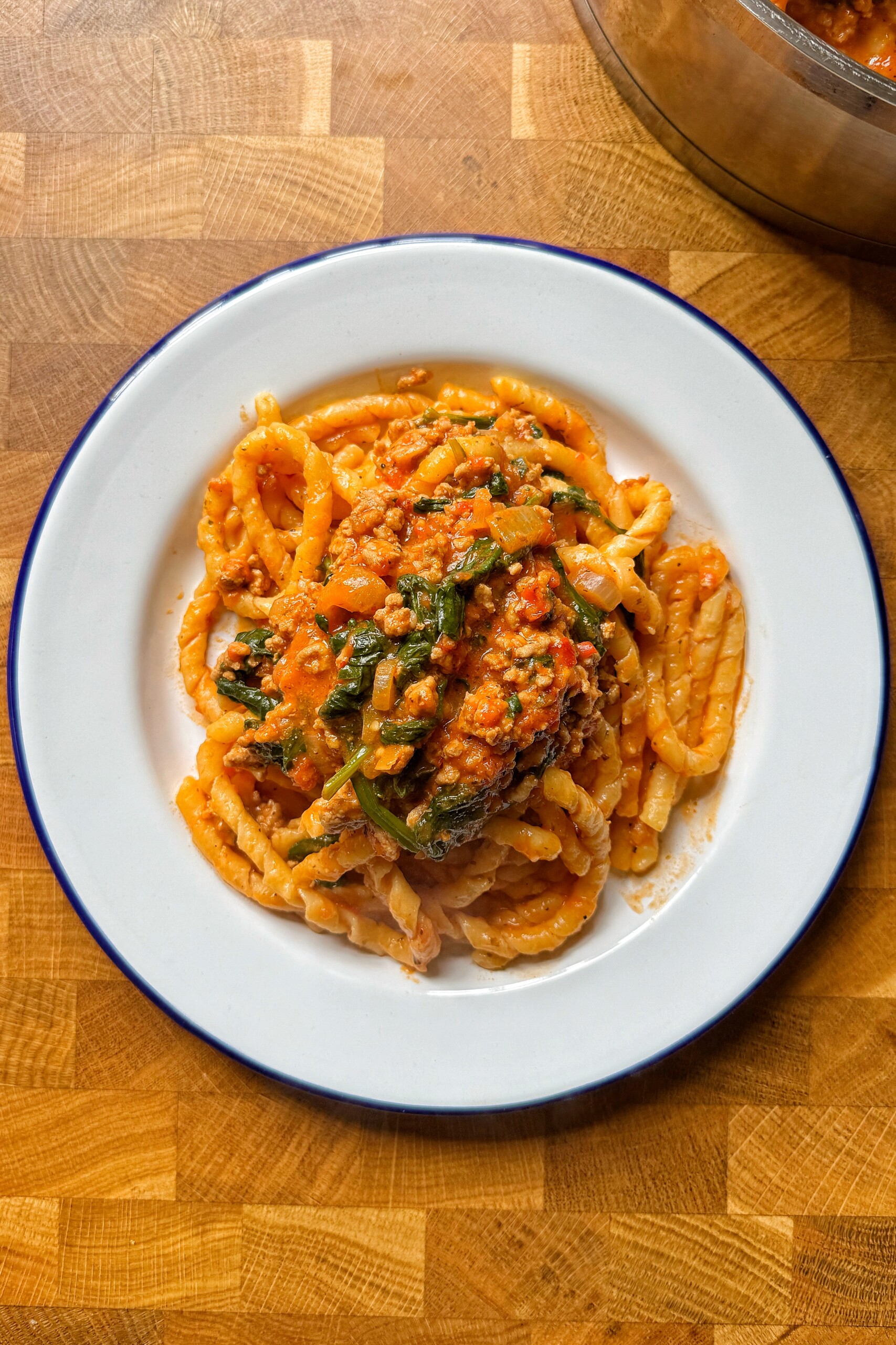 turkey pasta in white bowl.