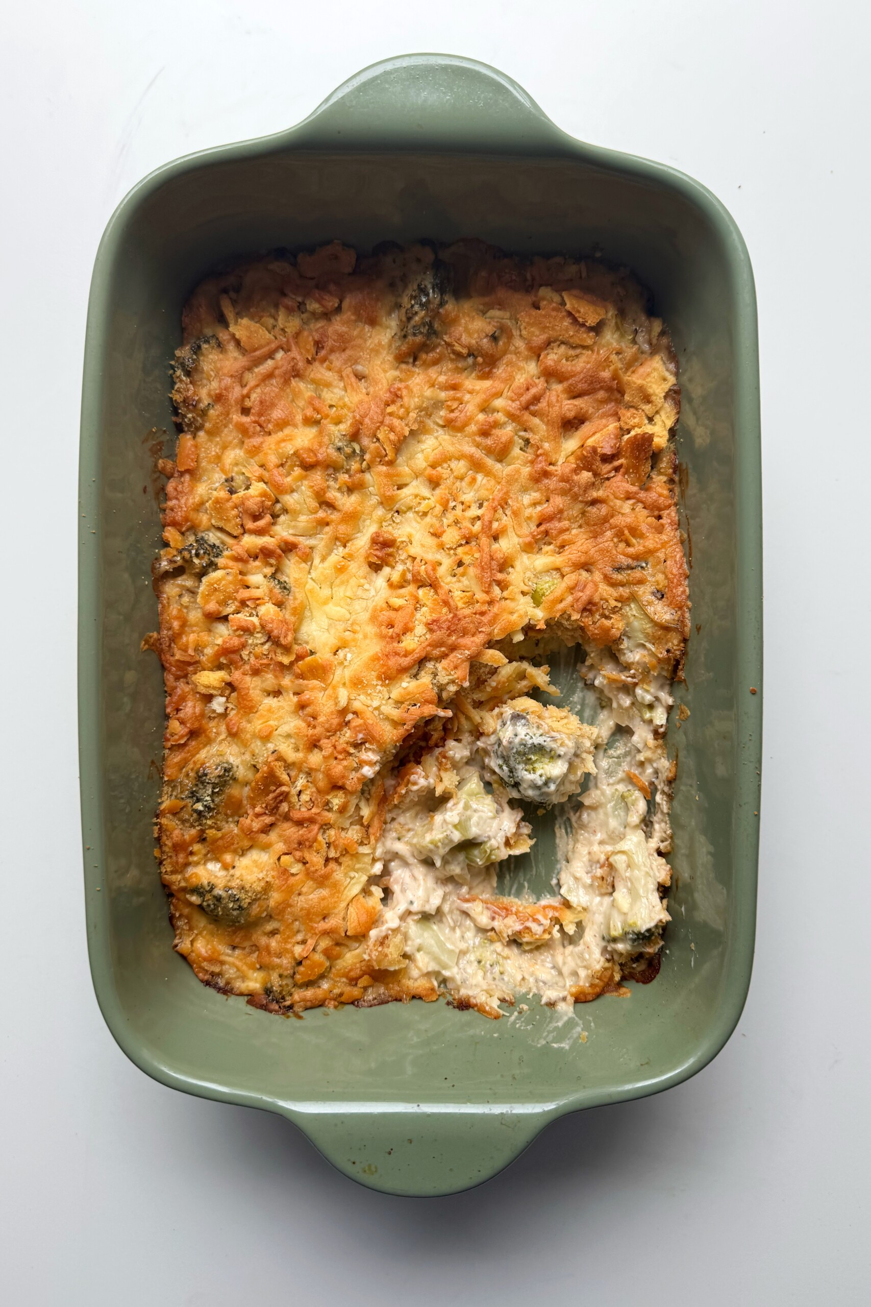 baked broccoli casserole with cheddar cheese.