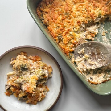 dish of broccoli casserole with a bowl of broccoli casserole.