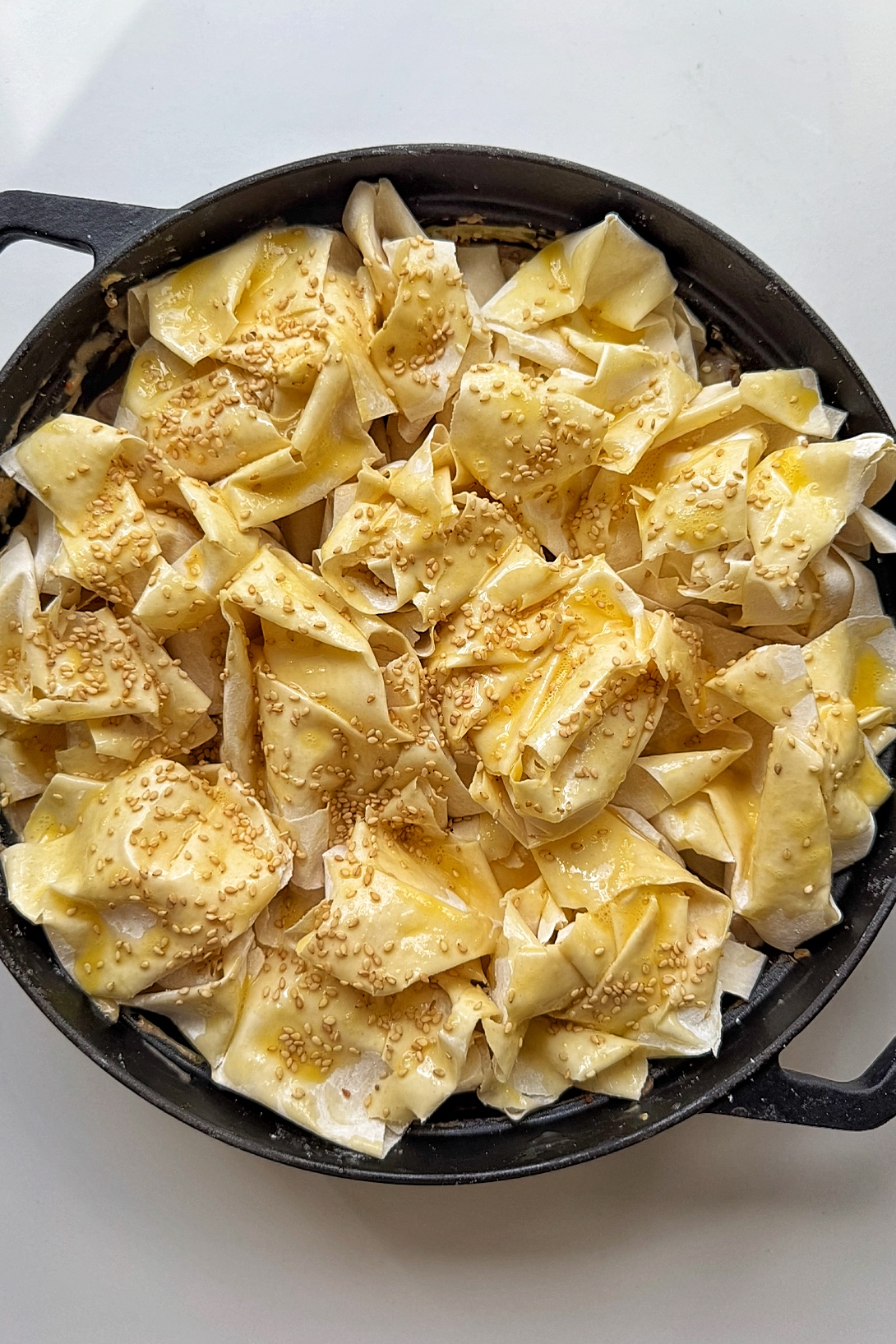 Filo pastry on top of mushroom pie.