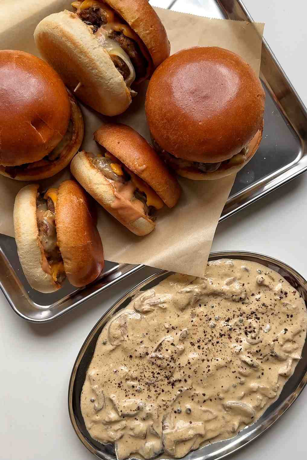 tray of burgers.