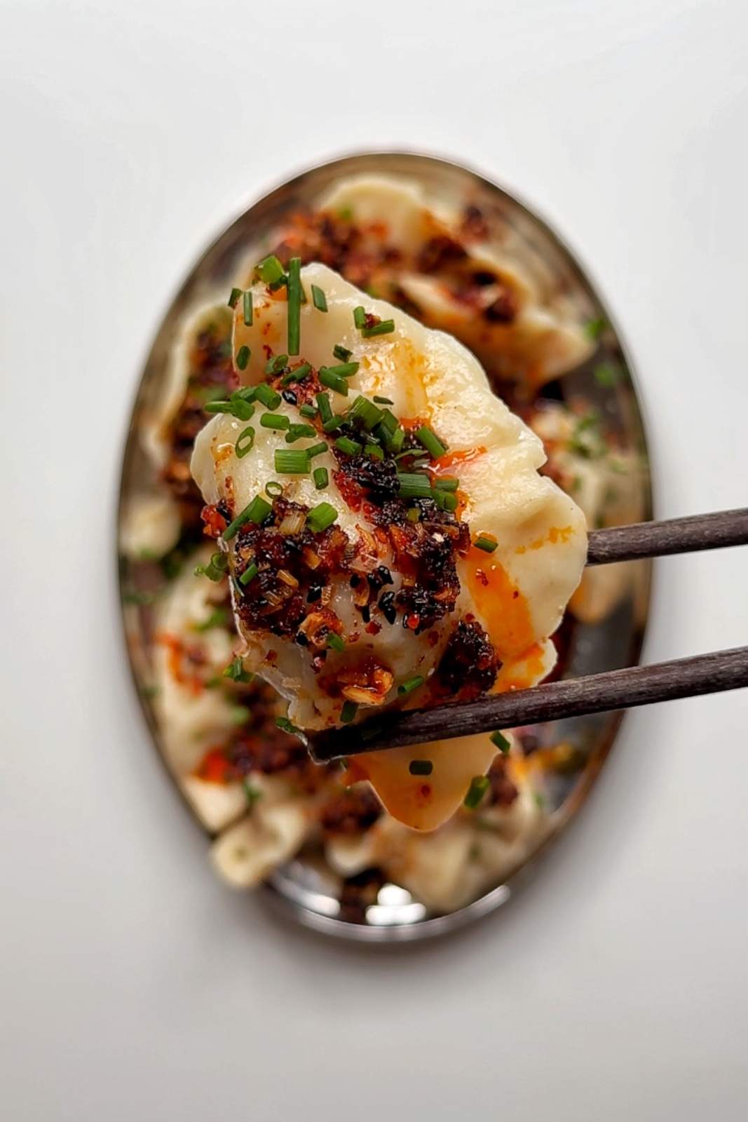 Pork and shrimp dumplings with chilli oil.